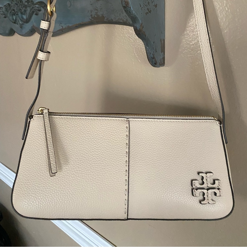 Beige shoulder bag, 10”W.  4.5” H, short shoulder strap 30”